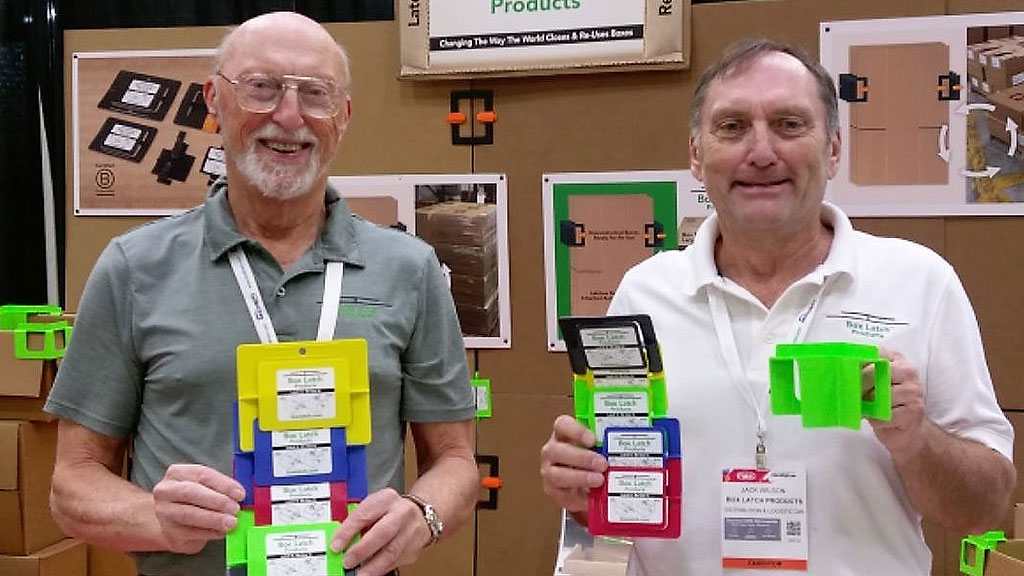 Box Latch - Jim and Jack Wilson holding products in a trade show booth