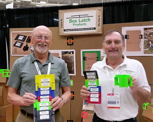 Box Latch - Jim and Jack Wilson holding products in a tradeshow booth
